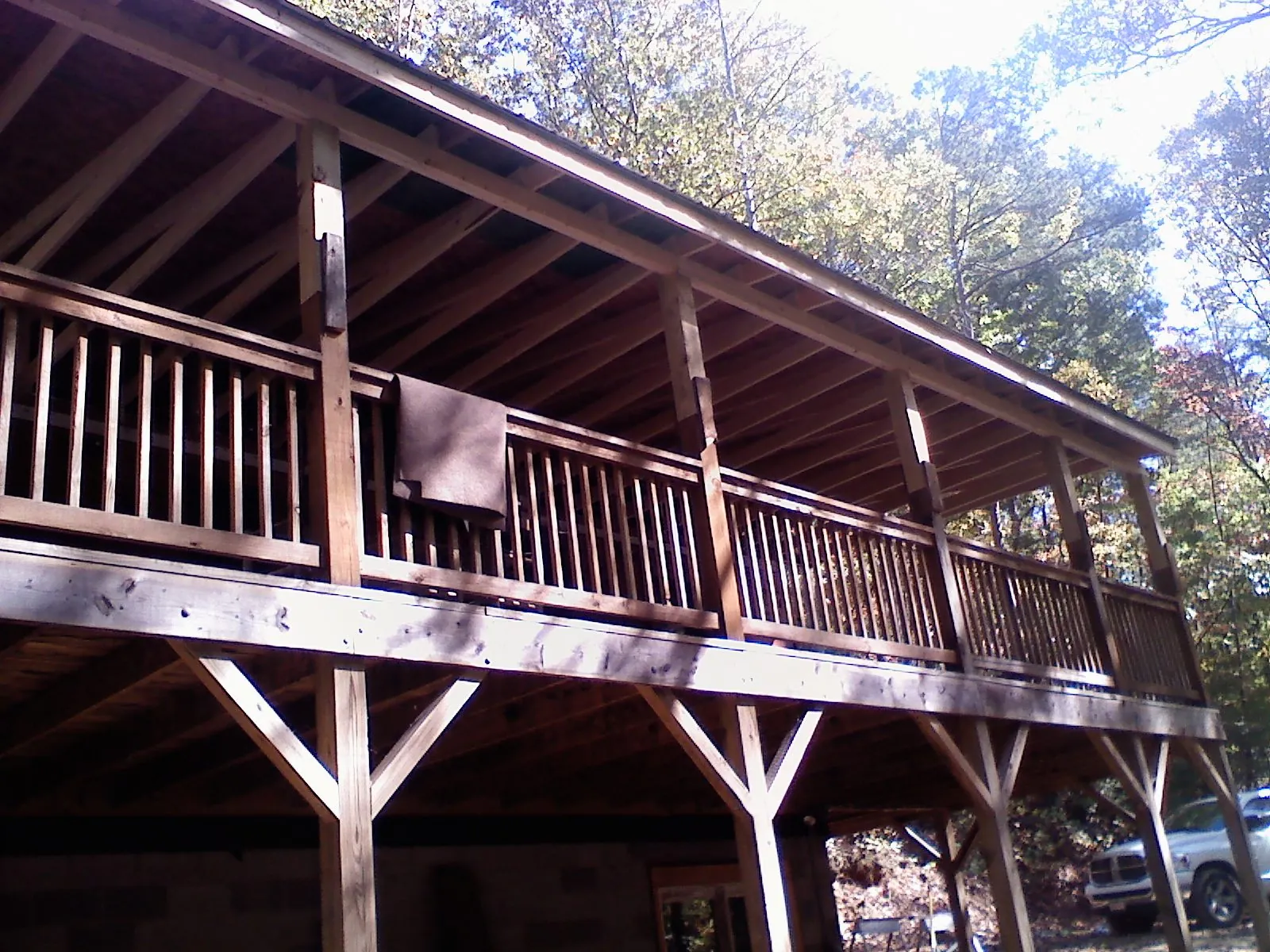 Timber framing under a new elevated porch and deck — Roof Leak Repair in South Easton by Roofing Brothers